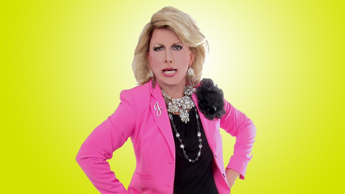 Joan Rivers in pink coat