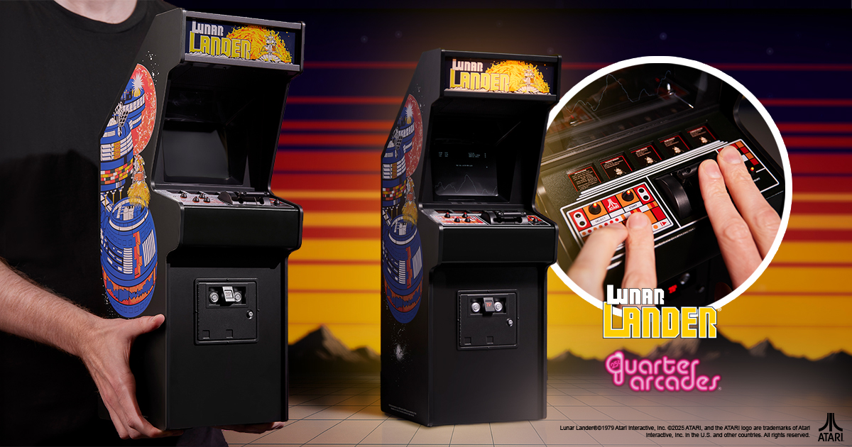 Person holding a quarter-scale replica of the Lunar Lander arcade cabinet