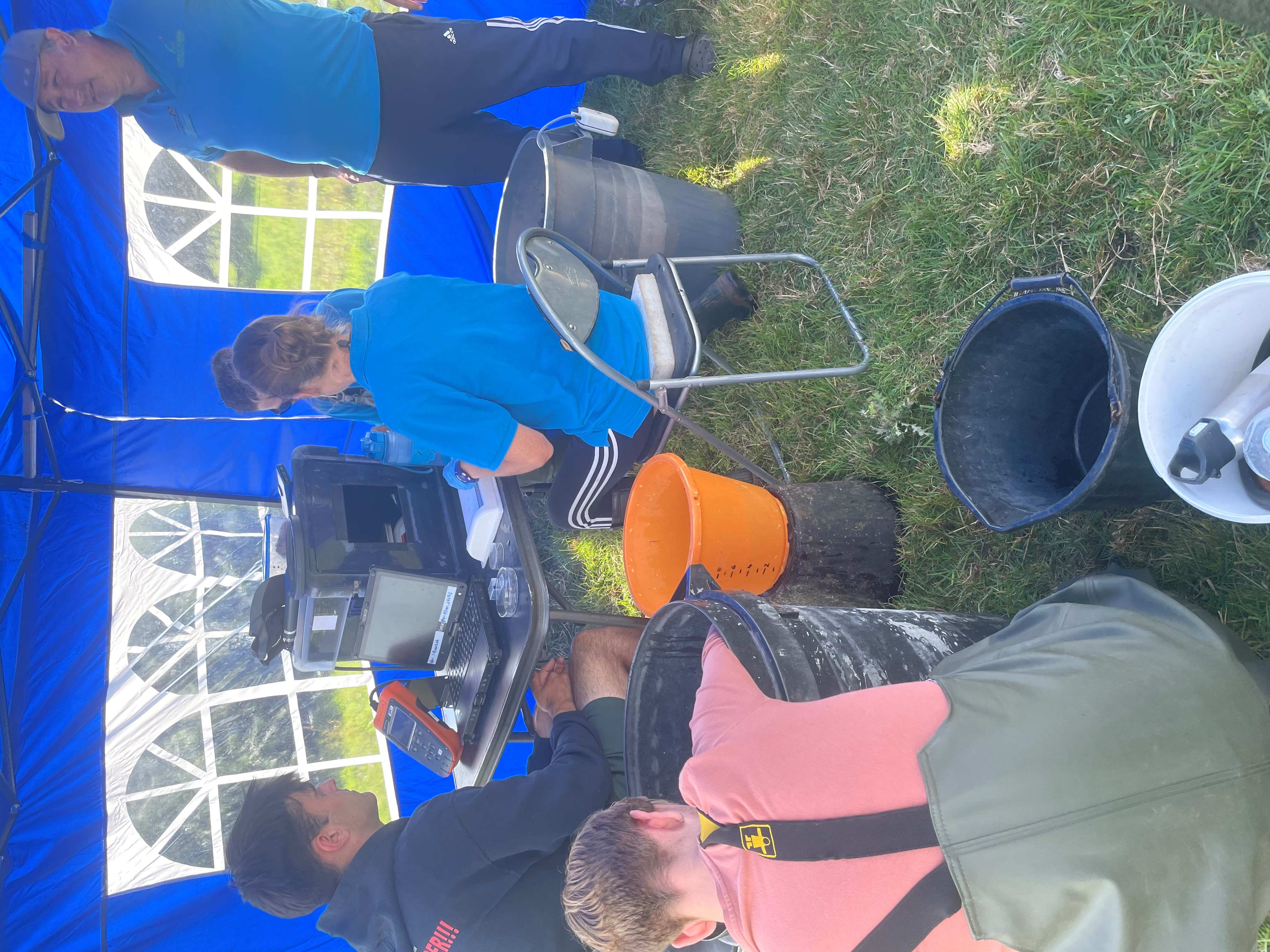 Mobile laboratory on the riverbank where the salmon parr are tagged and measured. c.GWCT