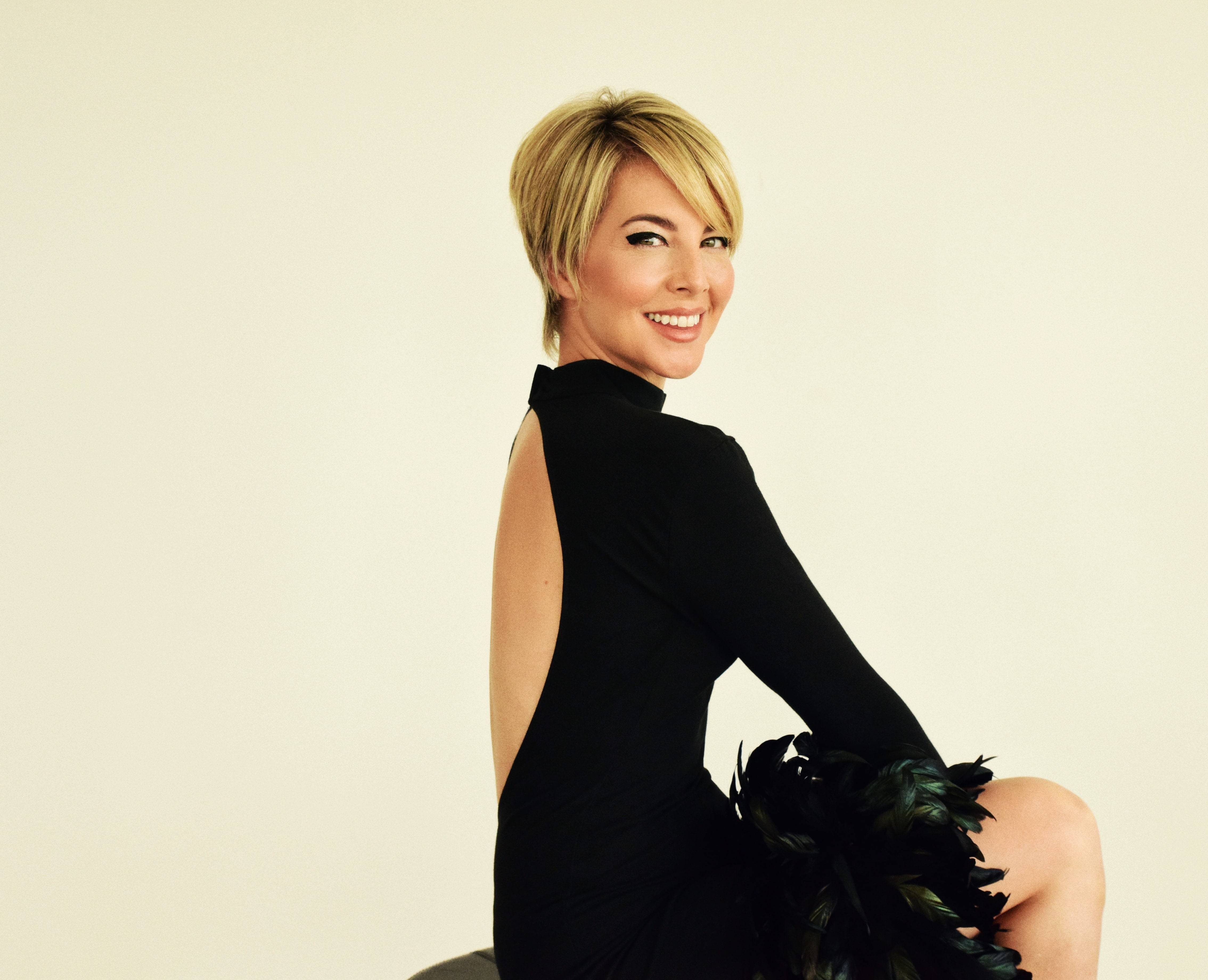 Morgan James in black dress