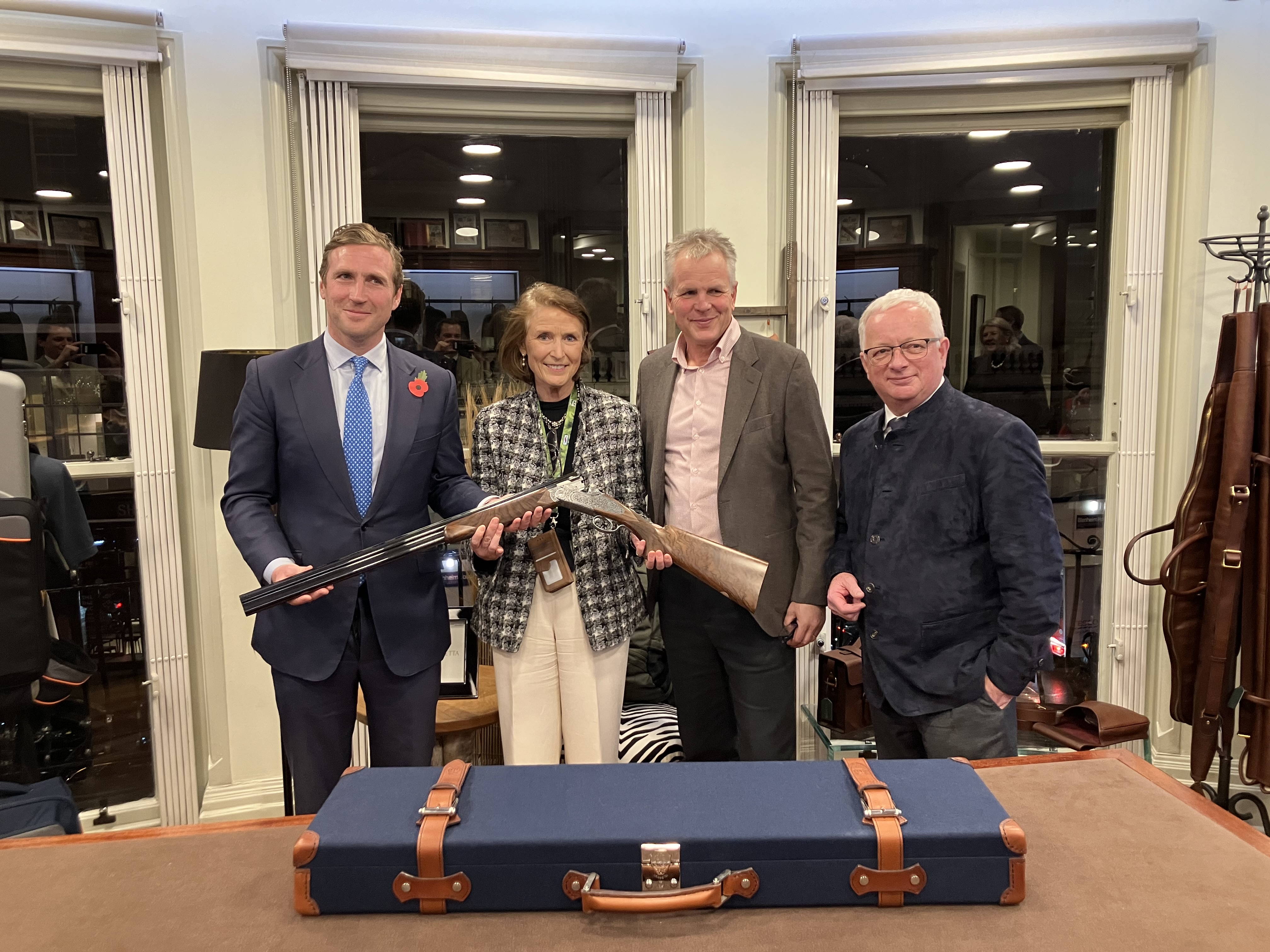 From the left: Winner Jack Mann, Teresa Dent, CEO of GWCT, Karl Waktare, Managing Director of GMK, and Tim King, Beretta Gallery Manager